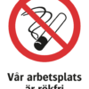 Förbudsskylt med symbol för rökning förbjuden och texten "Vår arbetsplats är rökfri"