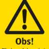 Varningsskylt med symbol för varning för fara och texten "Varning! Filminspelning pågår".